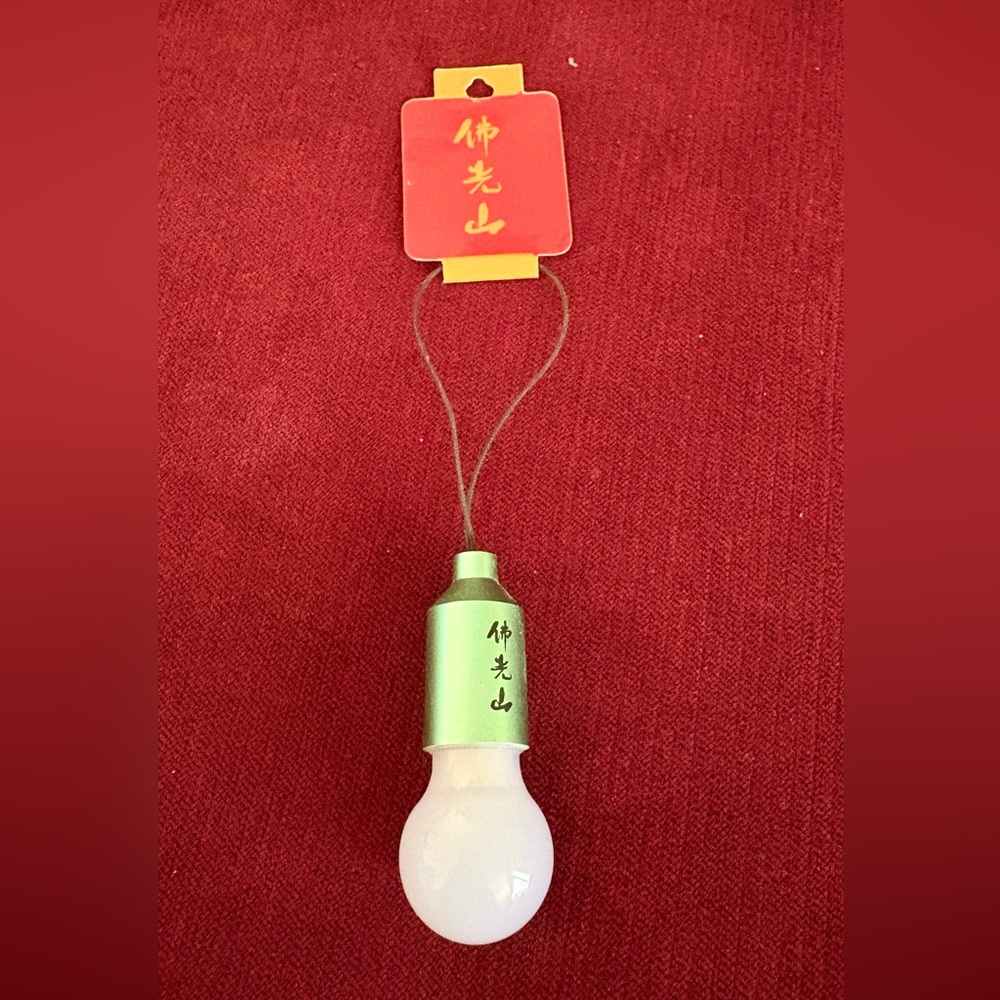 Never Use Mascot Light Bulb Shape Flashlight